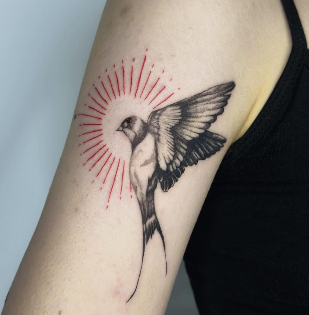 Swallow with Radiant Red Halo Tattoo bird tattoo ideas for women with meaning tattoo