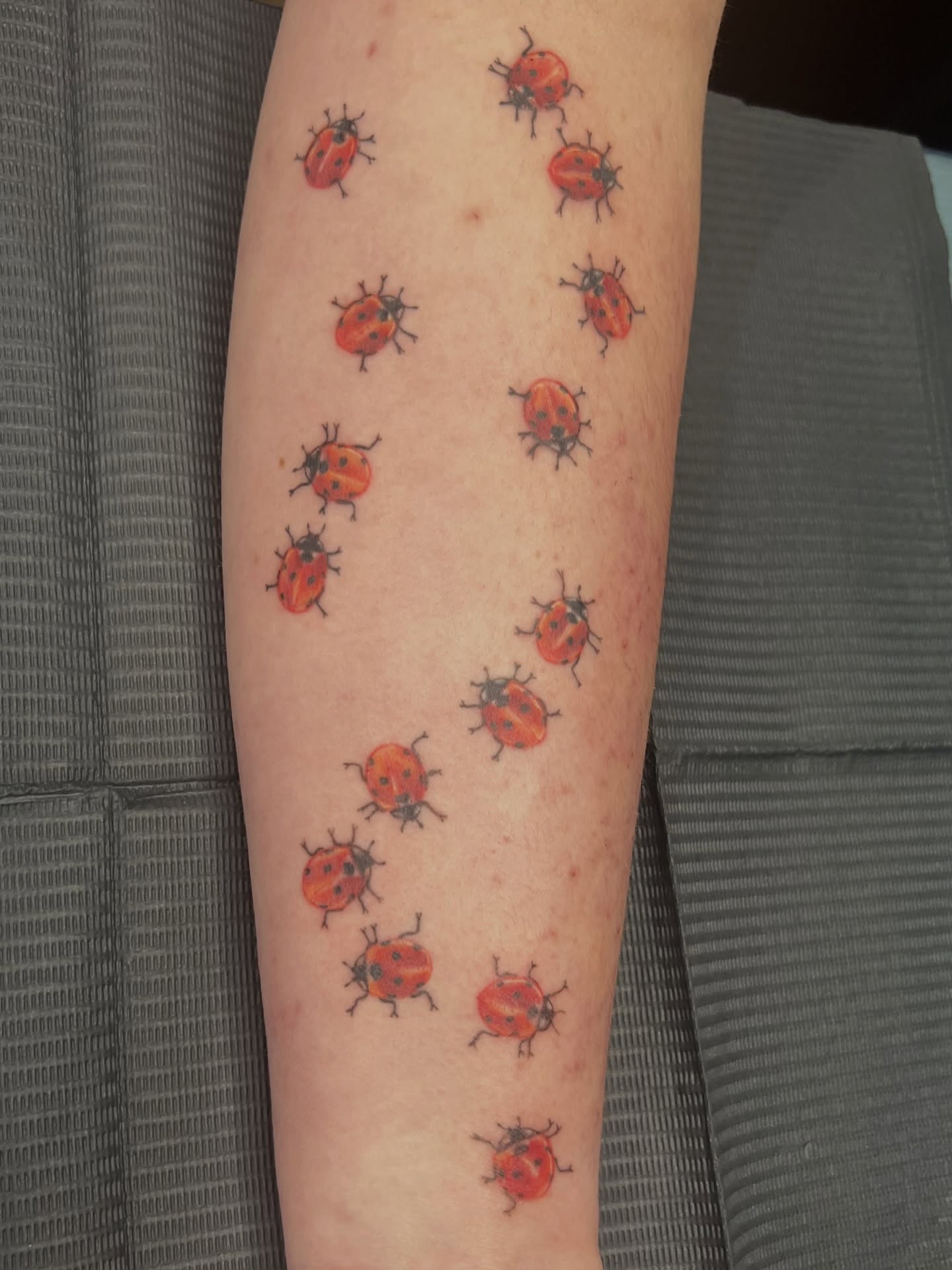Tiny Ladybug Tattoo Near The Ankle