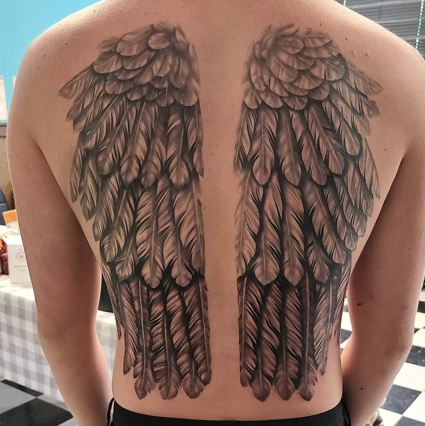 Symmetrical Full-Back Angel Wings with Layered Feathering angel wings tattoo ideas on back tattoo