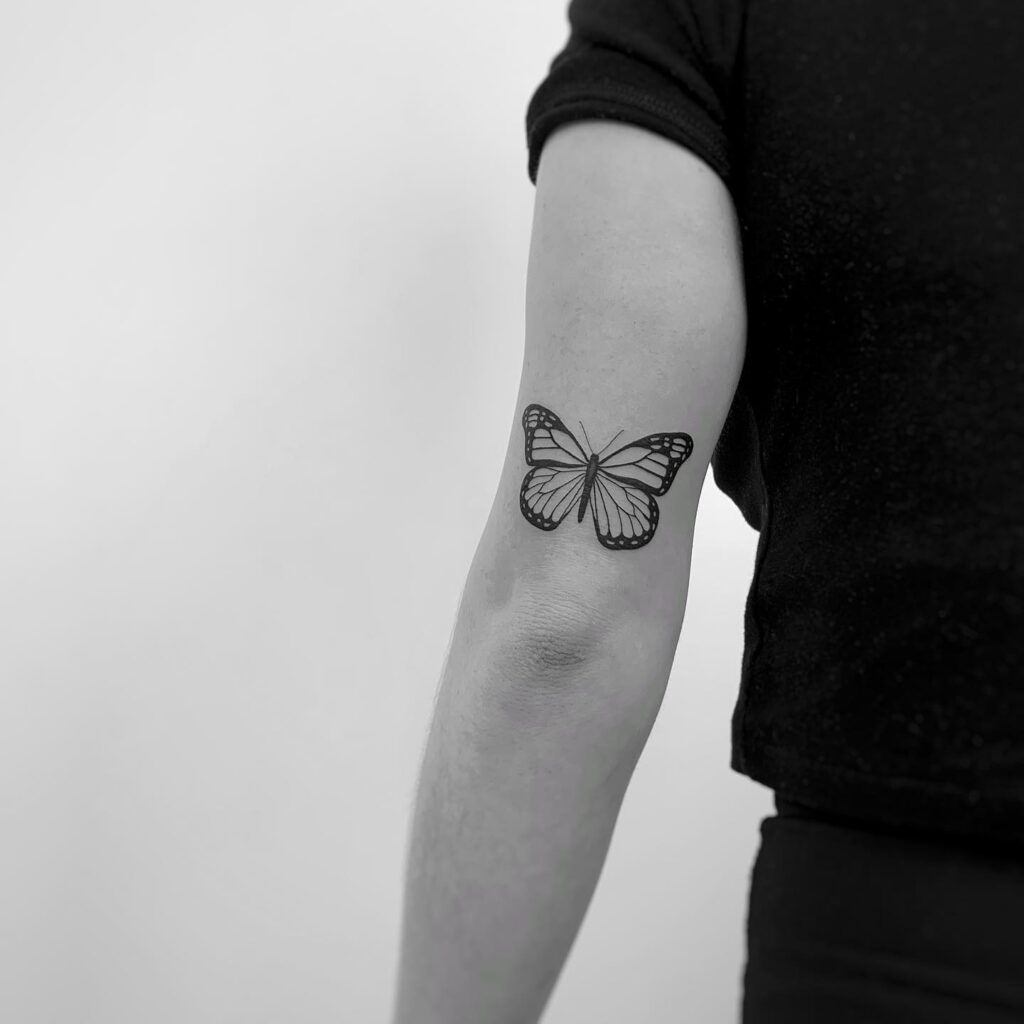 Monarch butterfly tattoo on arm