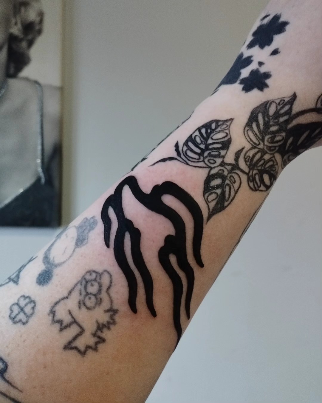Abstract Black Flame Gap Filler Tattoo