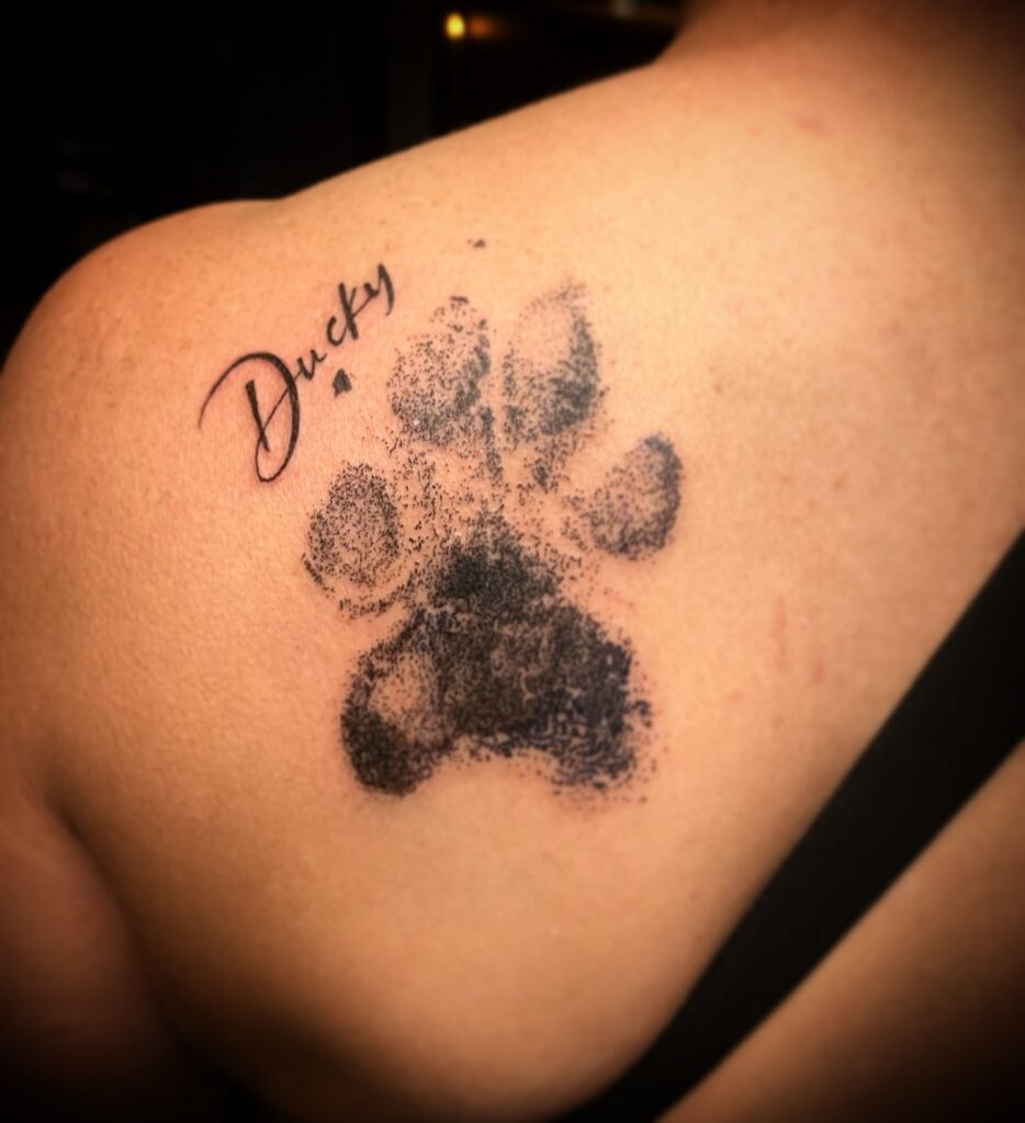 Textured Paw Print Tattoo with Name paw print tattoo ideas tattoo