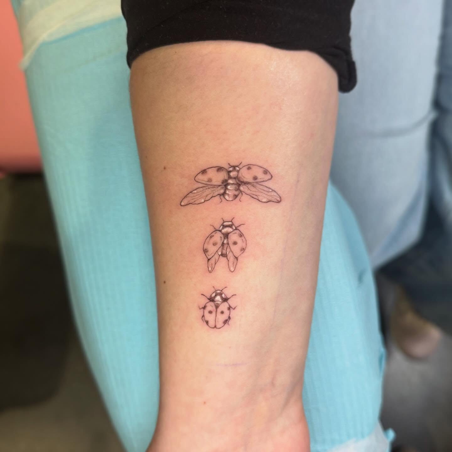 Tiny Ankle Ladybug Tattoo