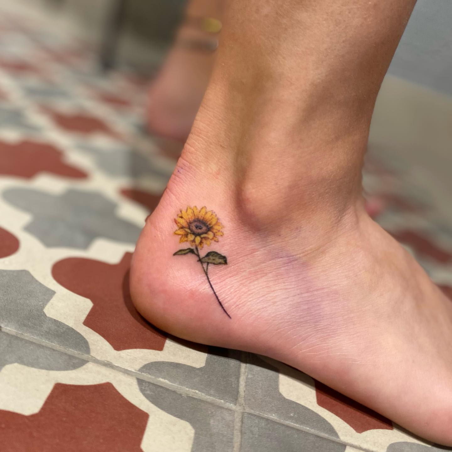 Tiny Ankle Sunflower Tattoo small sunflower tattoos ideas tattoo
