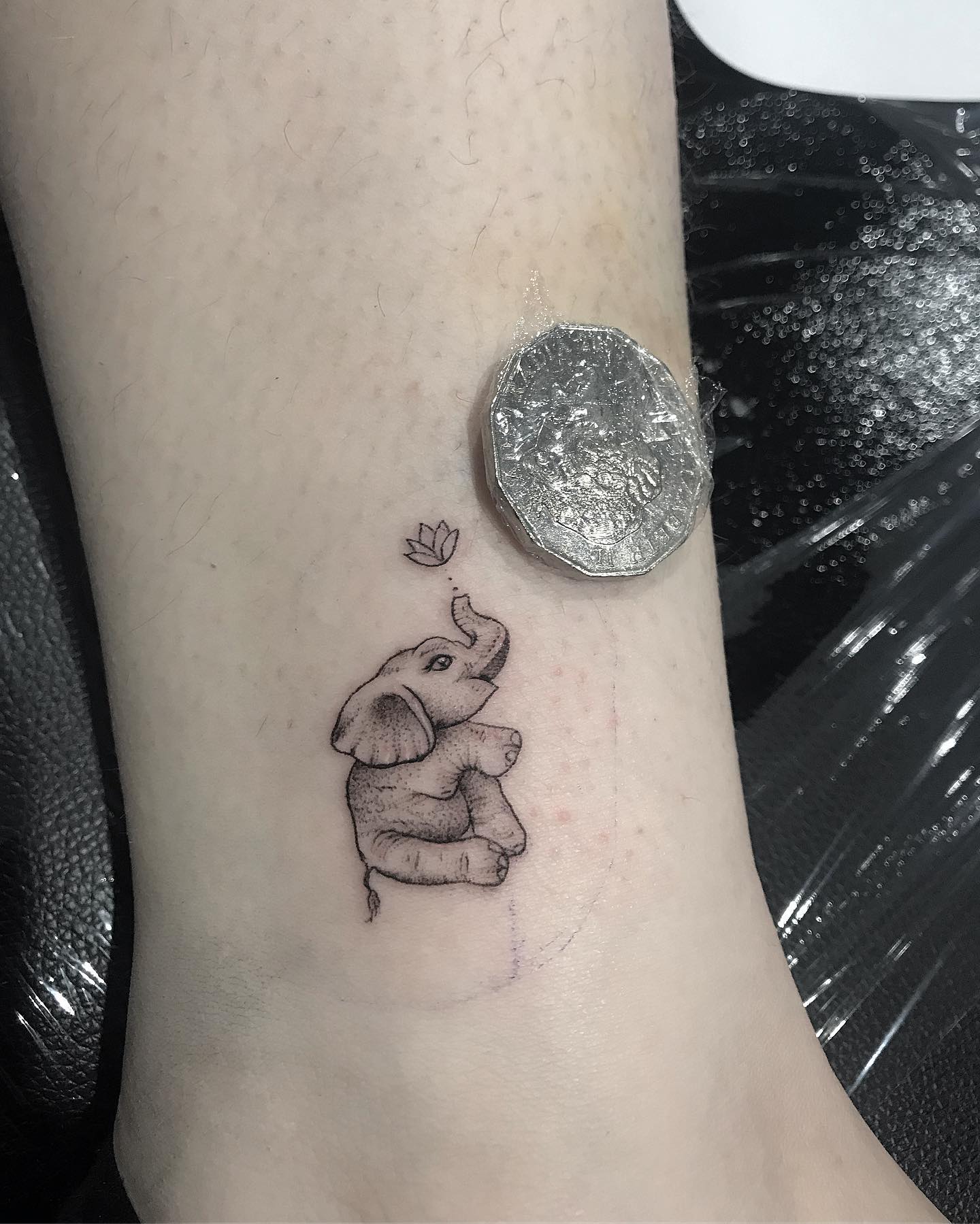 Tiny Baby Elephant and Lotus Tattoo baby elephant tattoo ideas tattoo