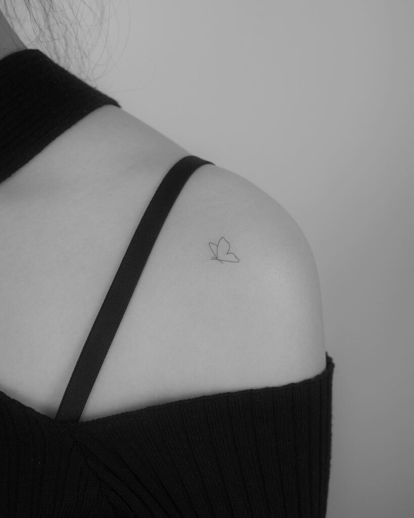 Tiny Butterfly Shoulder Tattoo