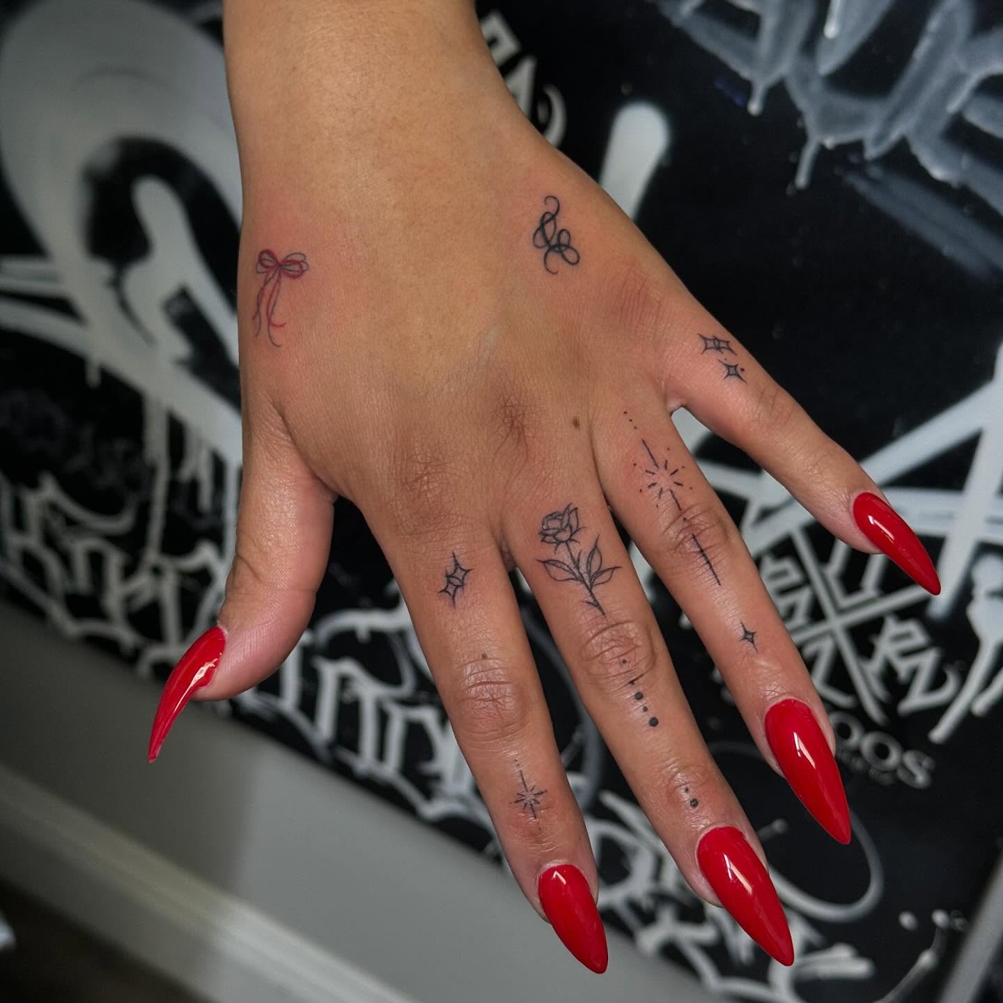 Rose And Butterfly Hand Tattoo