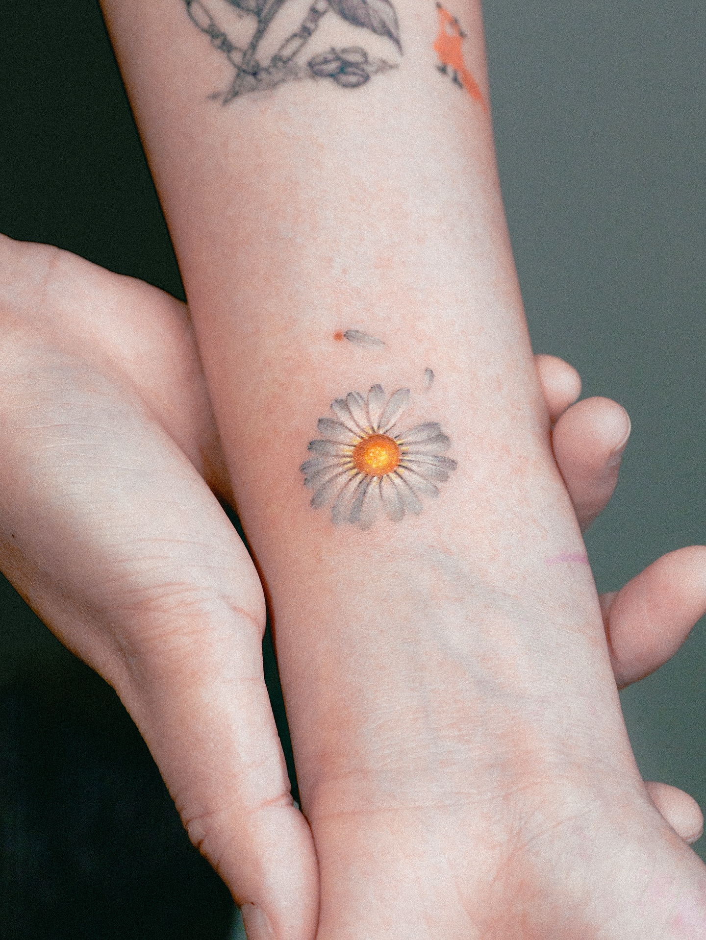 Tiny Single Daisy Tattoo daisy tattoo ideas tattoo