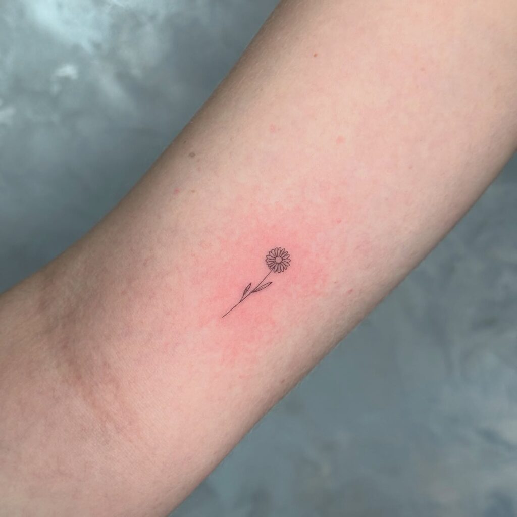 Tiny Daisy Tattoo