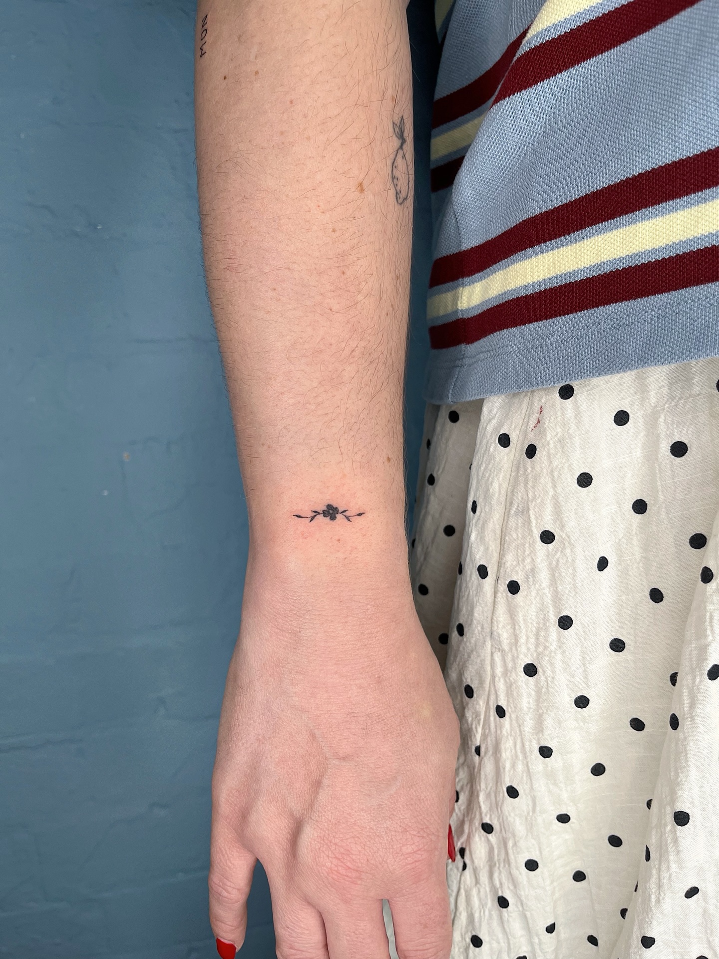 Tiny Starburst And Hearts Wrist Tattoo