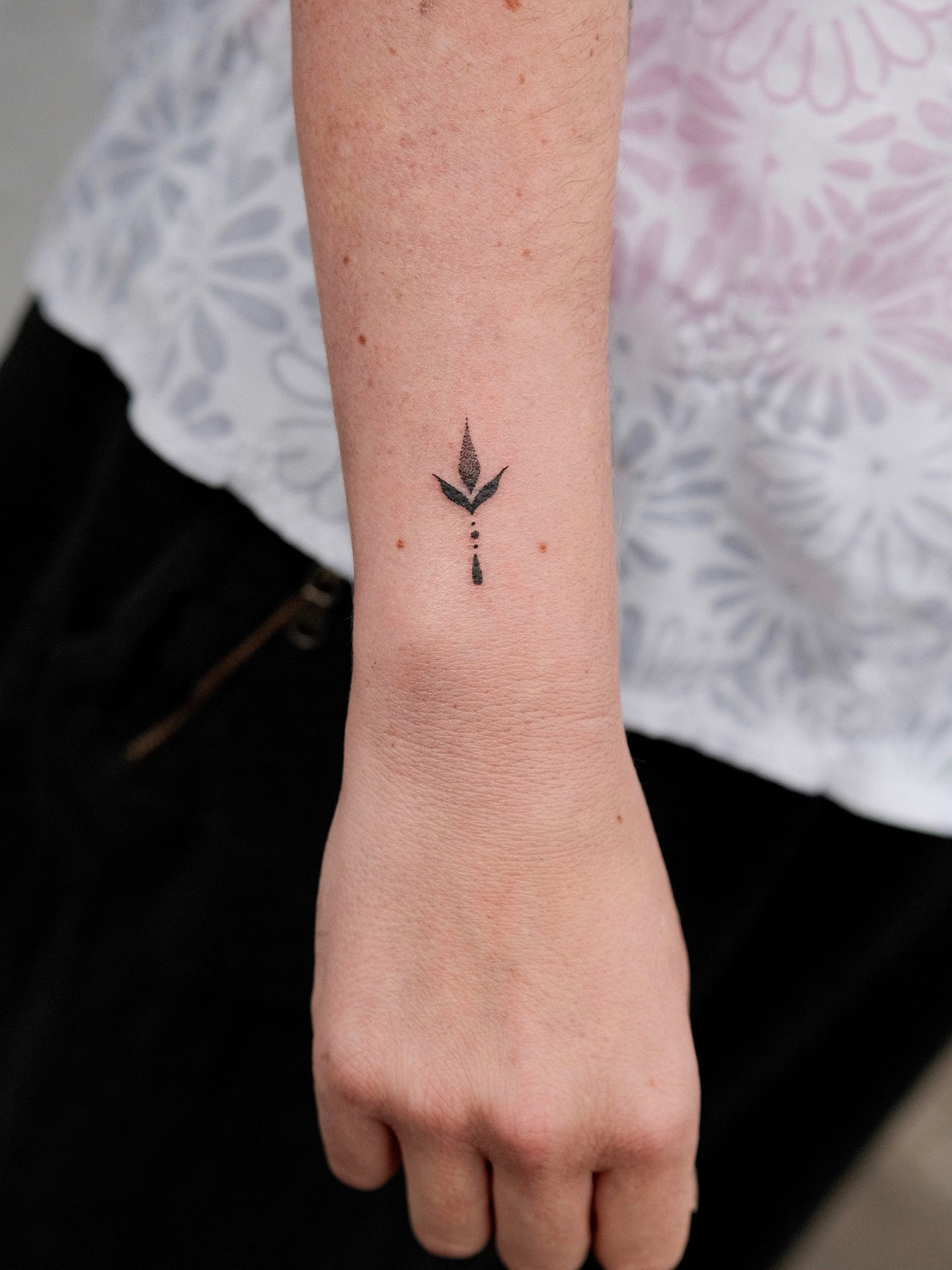 Small Red Heart Outline Wrist Tattoo