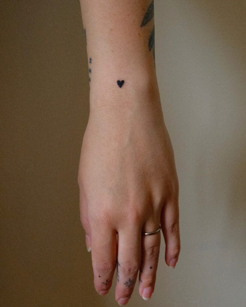 Feather And Free Script Tattoo