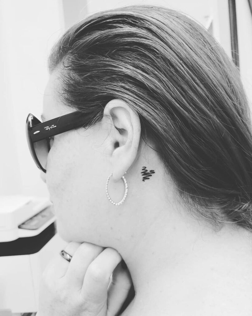 Flying Birds Behind Ear Tattoo