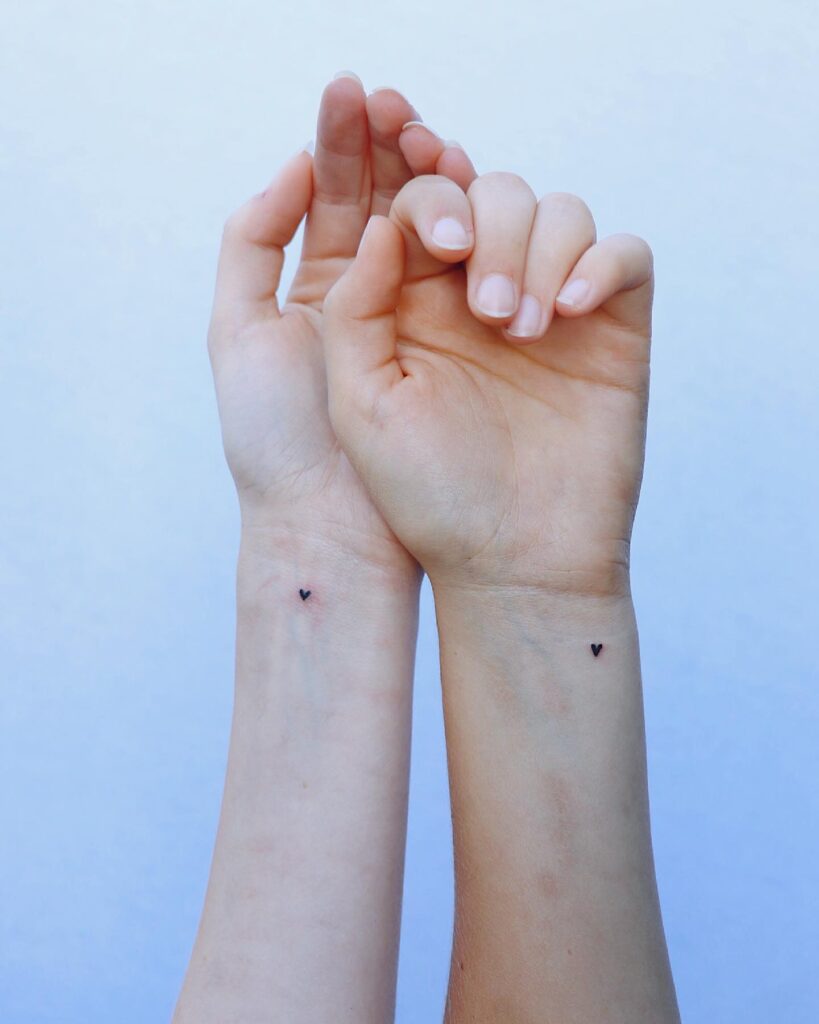 Tiny Matching Heart Wrist Tattoos for Best Friends matching best friend tattoos tattoo