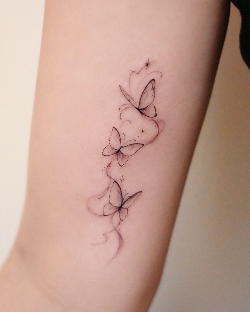 Tiny Micro Butterfly Behind the Ear butterfly tattoo