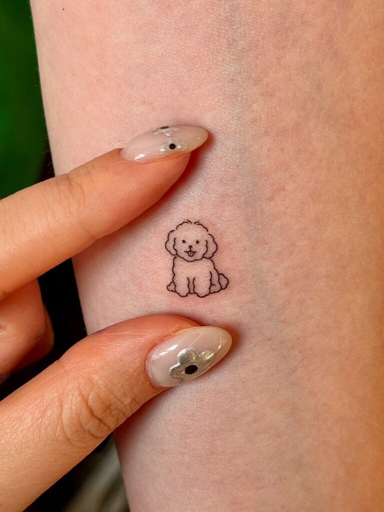 Tiny Poodle Line Art Tattoo meaningful tiny tattoos tattoo
