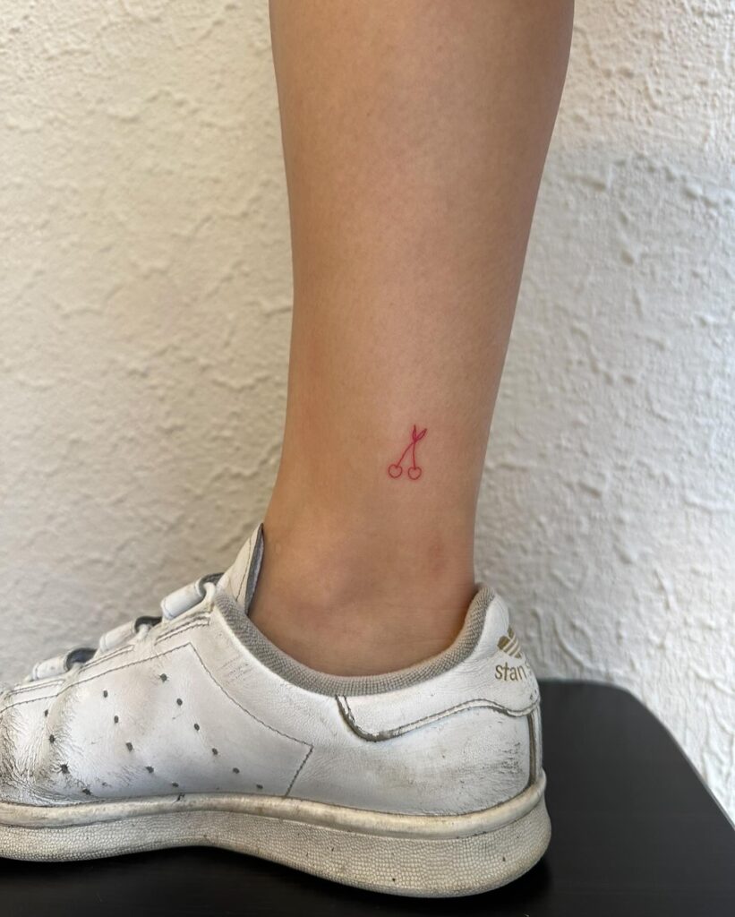 Tiny Red Cherry Tattoo on Ankle meaningful tiny tattoos tattoo
