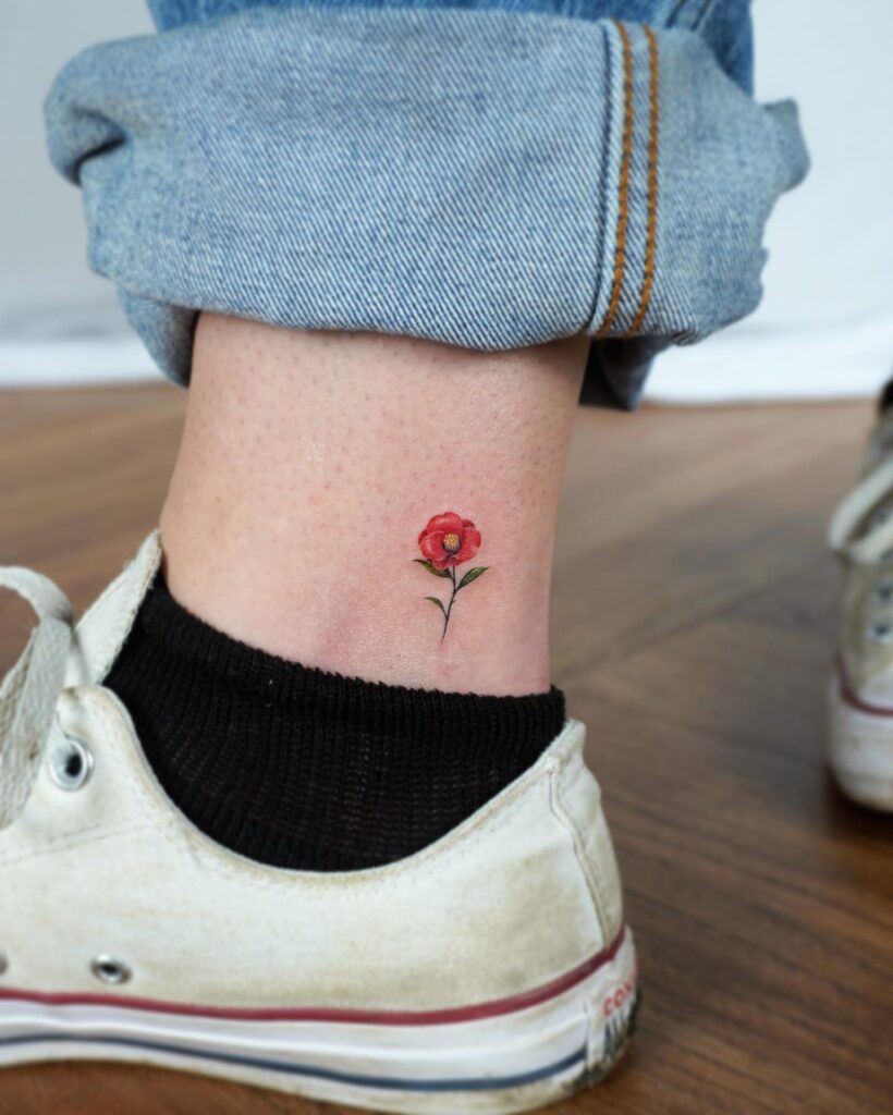 Tiny Red Flower Ankle Tattoo minimal tiny flower tattoo ideas tattoo