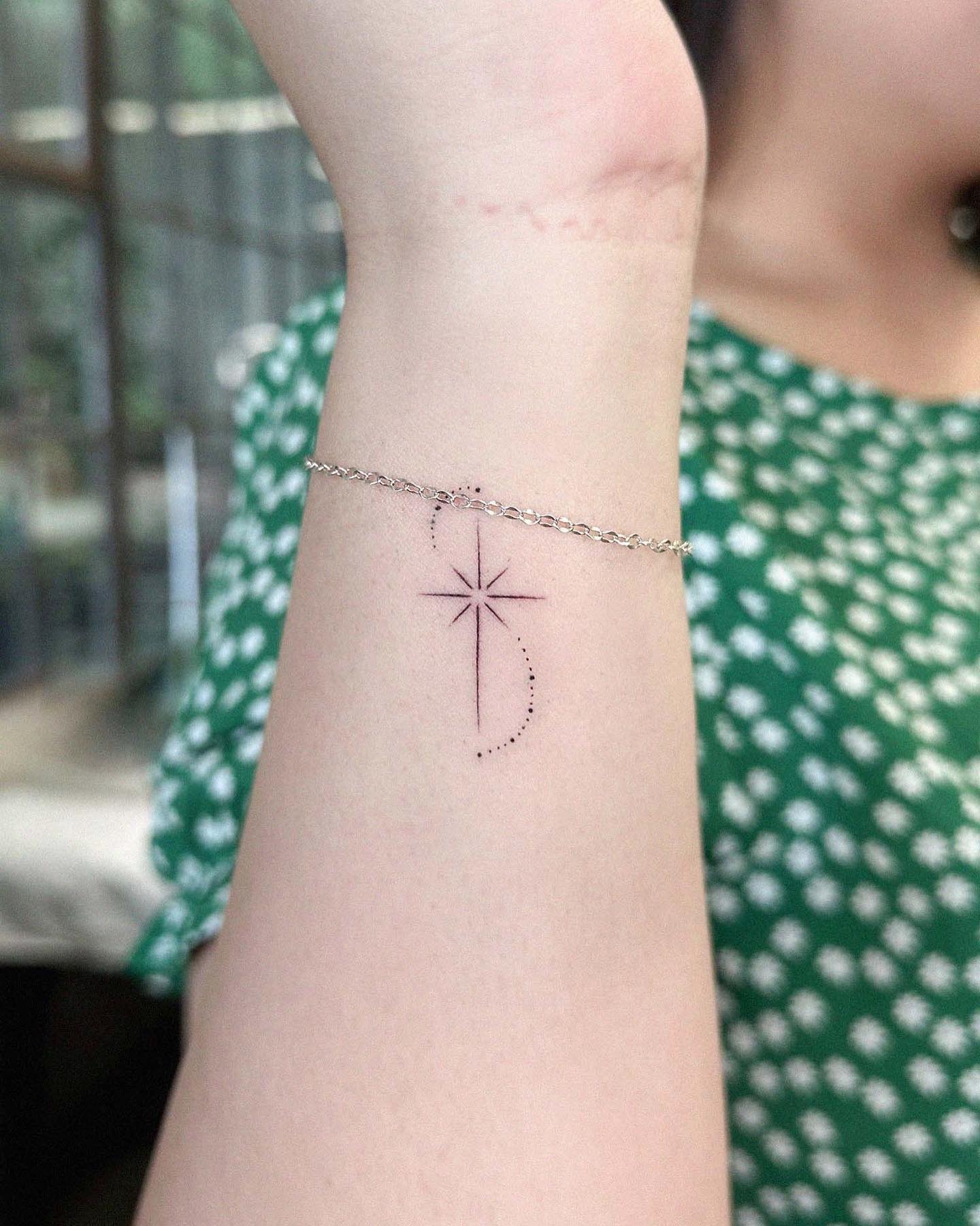 Tiny Solid Heart Wrist Tattoo