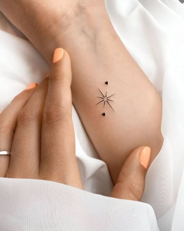Tiny Wildflower Wrist Tattoo