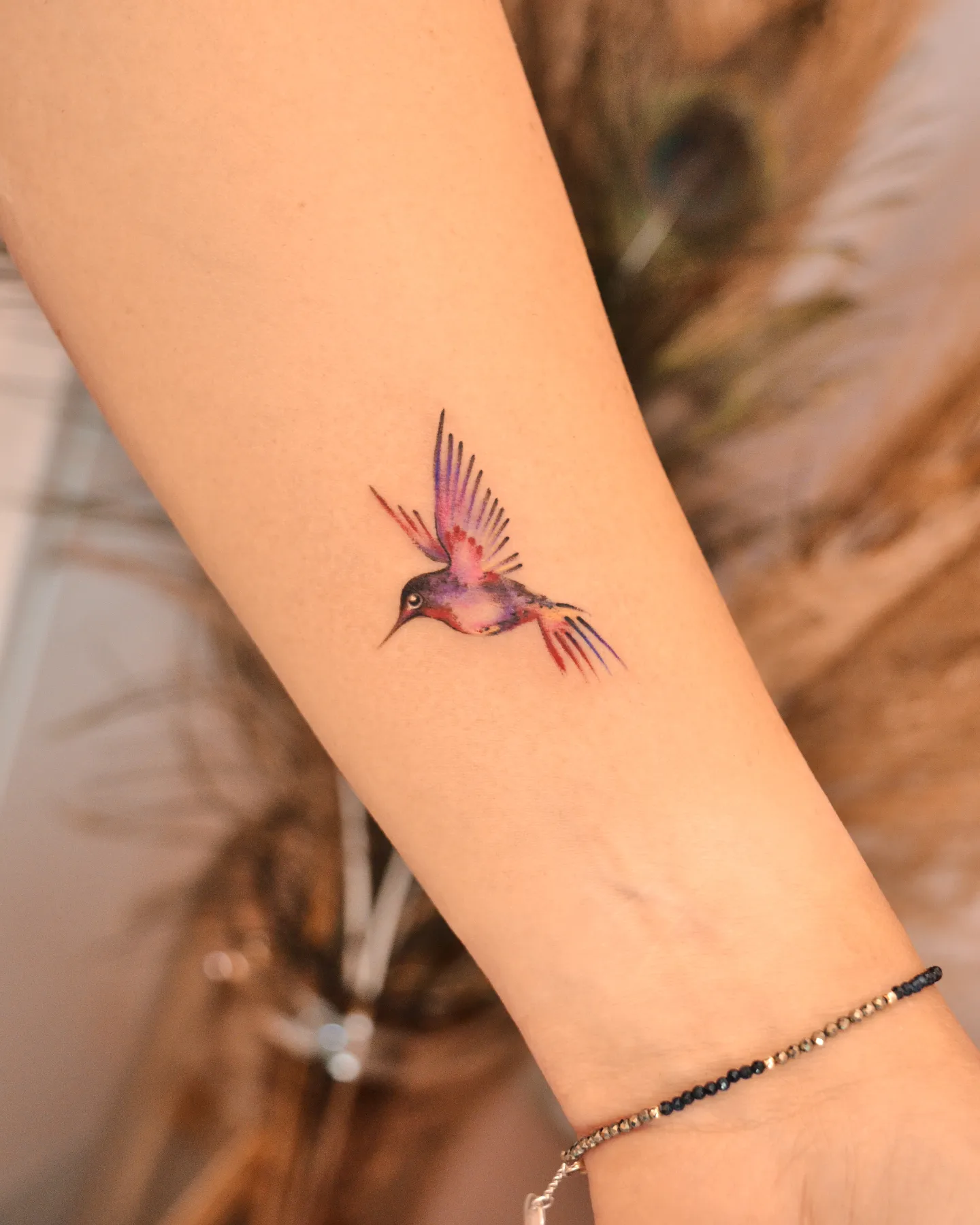 Tiny Watercolor Hummingbird Tattoo hummingbird tattoos ideas tattoo