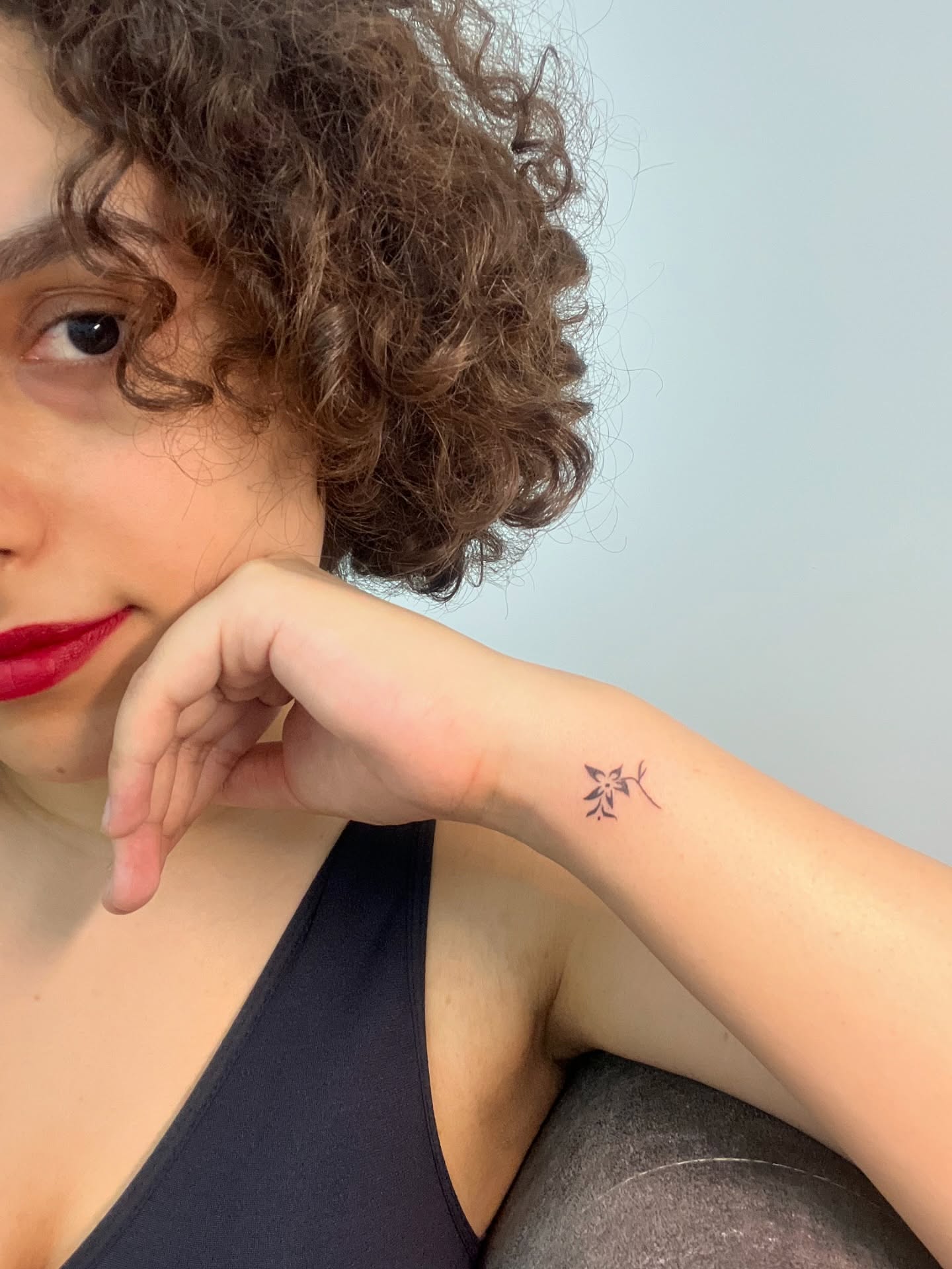 Tiny Crescent Moon Wrist Tattoo