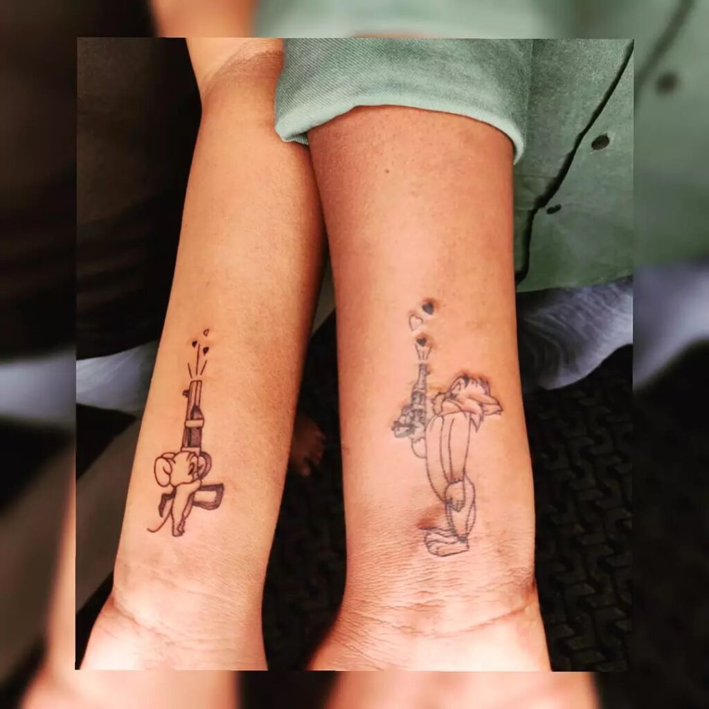 Tom and Jerry Shooting Hearts Tattoo brother sister tattoos tattoo