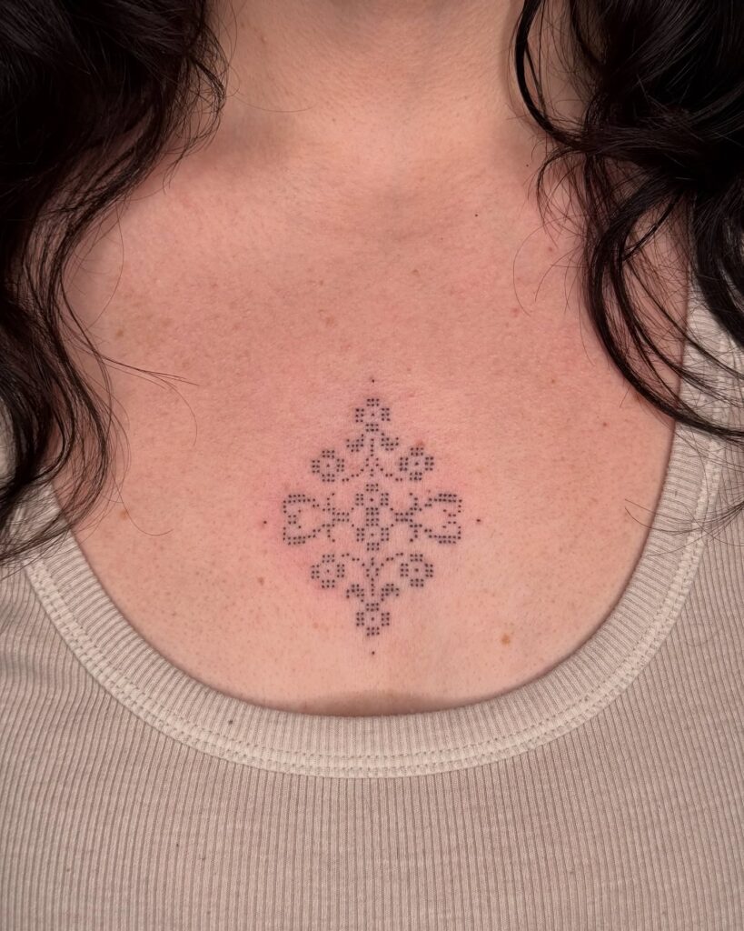 Traditional Folk-Inspired Chest Tattoo