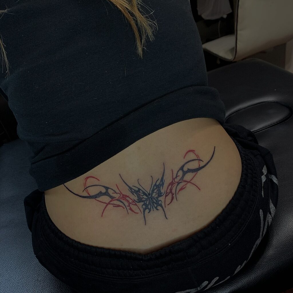 Red Tribal Heart Lower Back Tattoo