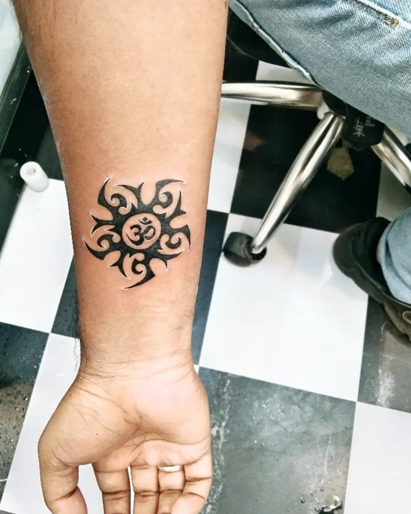 Tribal Sun Tattoo with Om Symbol sun tattoos tattoo