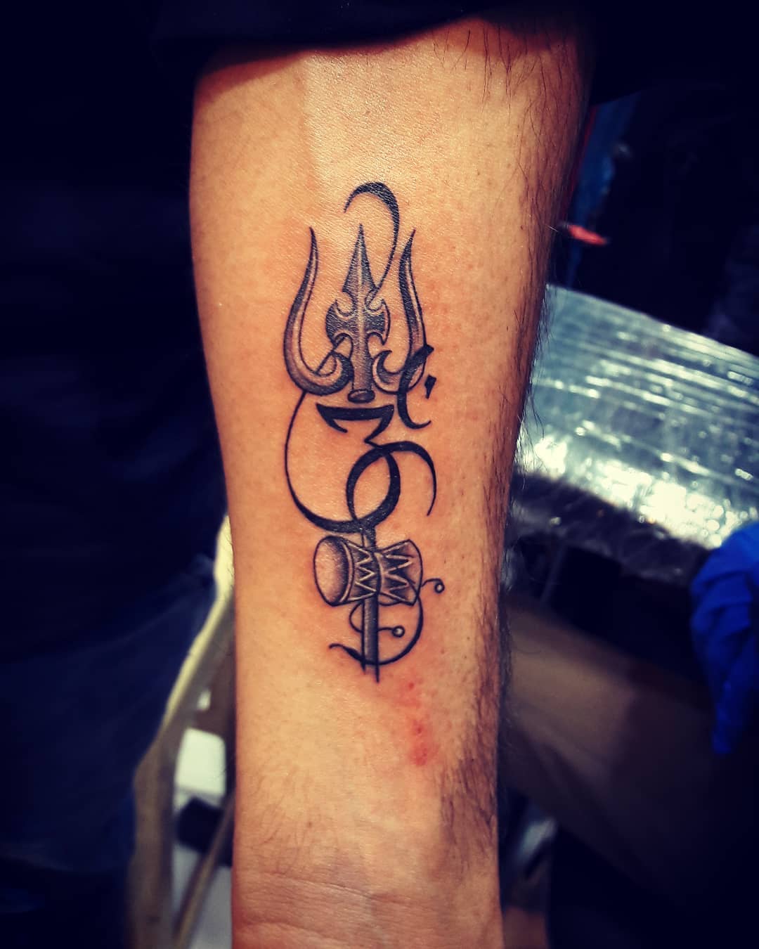 Trident and Drum Wrist Tattoo