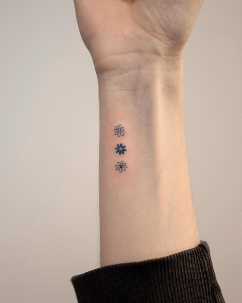 Trio of Blue Blossoms Tattoo flower wrist tattoo ideas tattoo