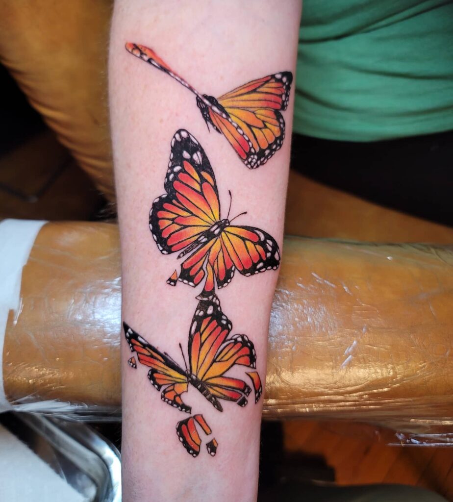 Three monarch butterflies tattoo