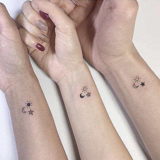 Trio Sun, Moon, and Star Wrist Tattoos for Best Friends matching best friend tattoos tattoo
