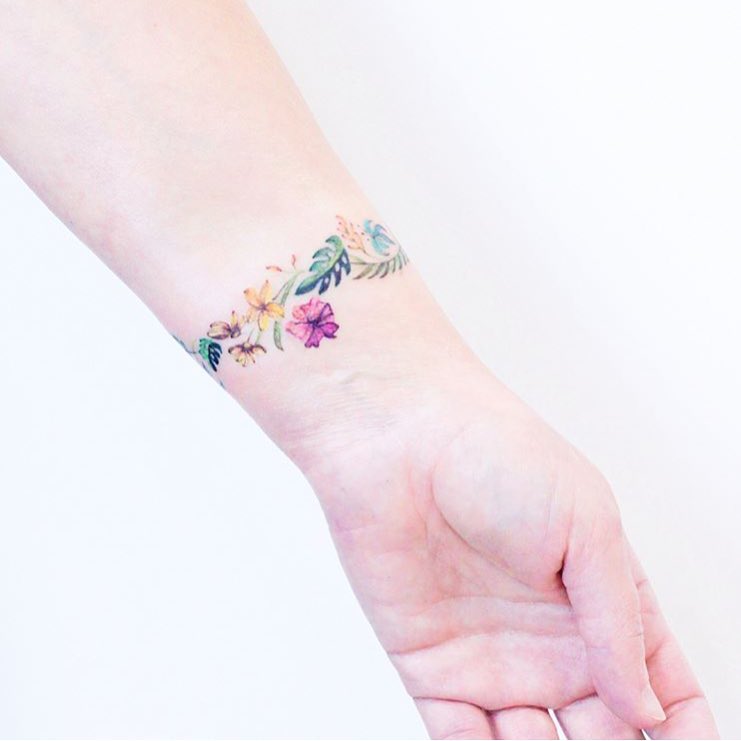 Rosary-Inspired Cross Bracelet Tattoo