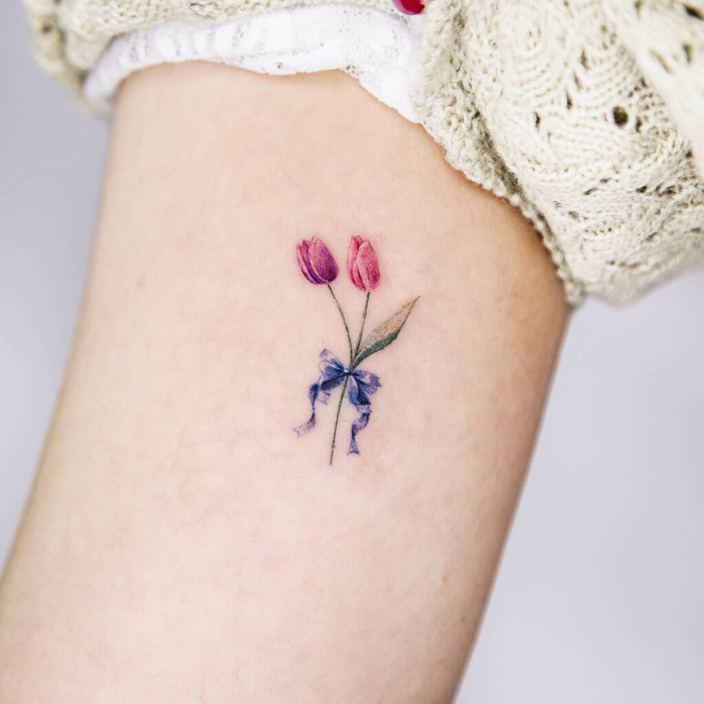 Tulip Pair with Bow Tattoo minimal tiny flower tattoo ideas tattoo