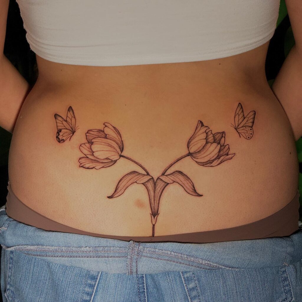 Longhorn Skull With Flames Lower Back Tattoo