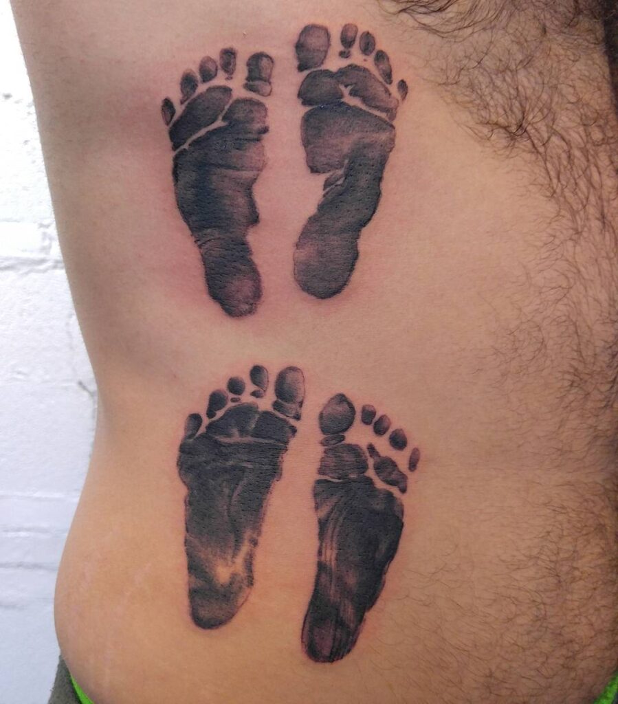 Twin Baby Footprints Tattoo baby feet tattoos tattoo