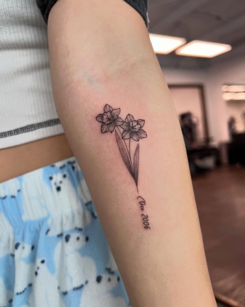 Twin Narcissus Tattoo with Birth Month Script december birth flower tattoo ideas tattoo