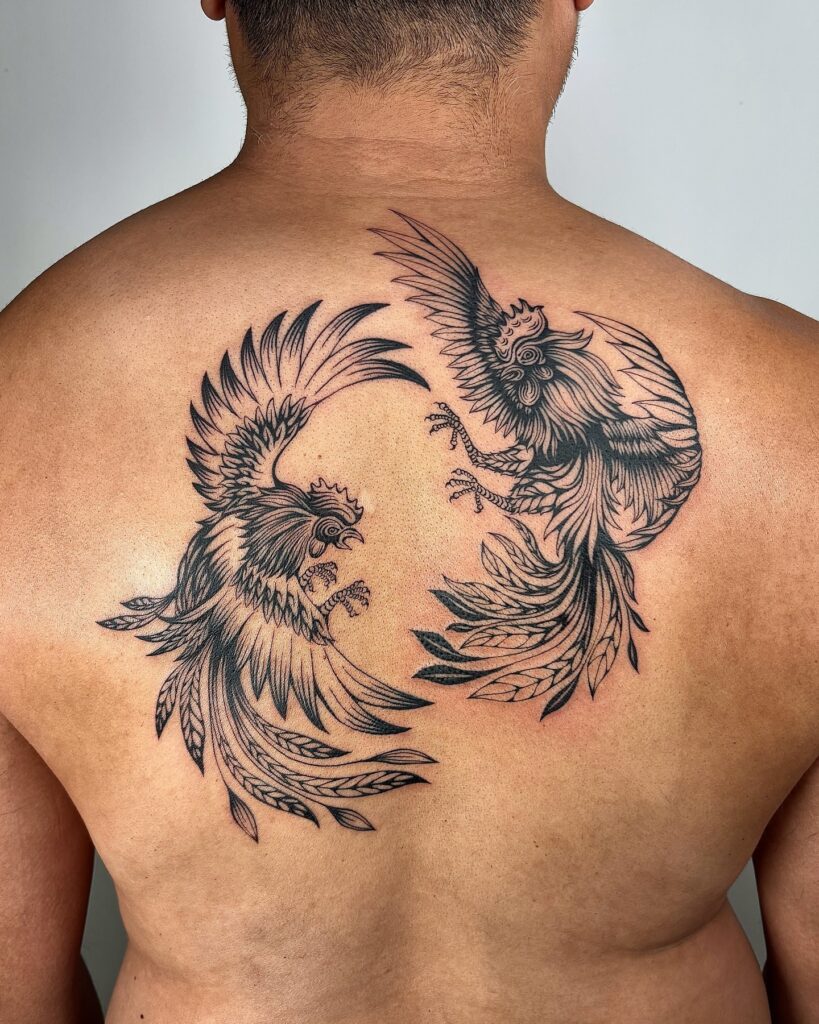 Twin Roosters Back Tattoo in Dynamic Motion back tattoos for guys tattoo