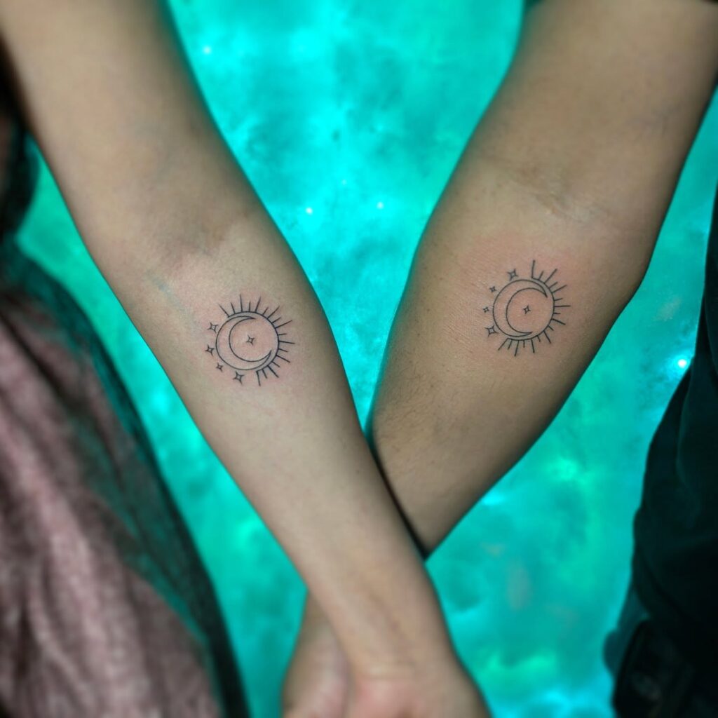 Matching sun and moon tattoos with stars and sparkles