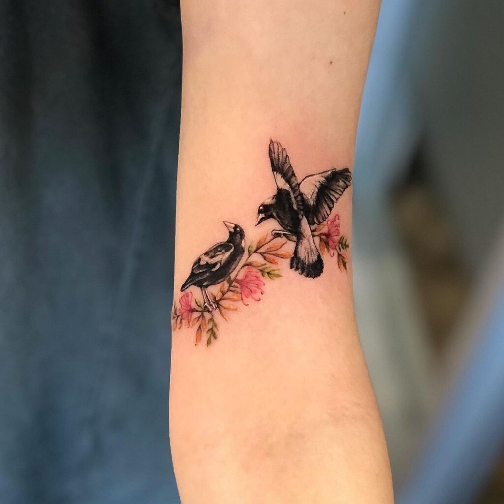 Two Magpies with Pink Blossoms Tattoo bird tattoo ideas for women with meaning tattoo