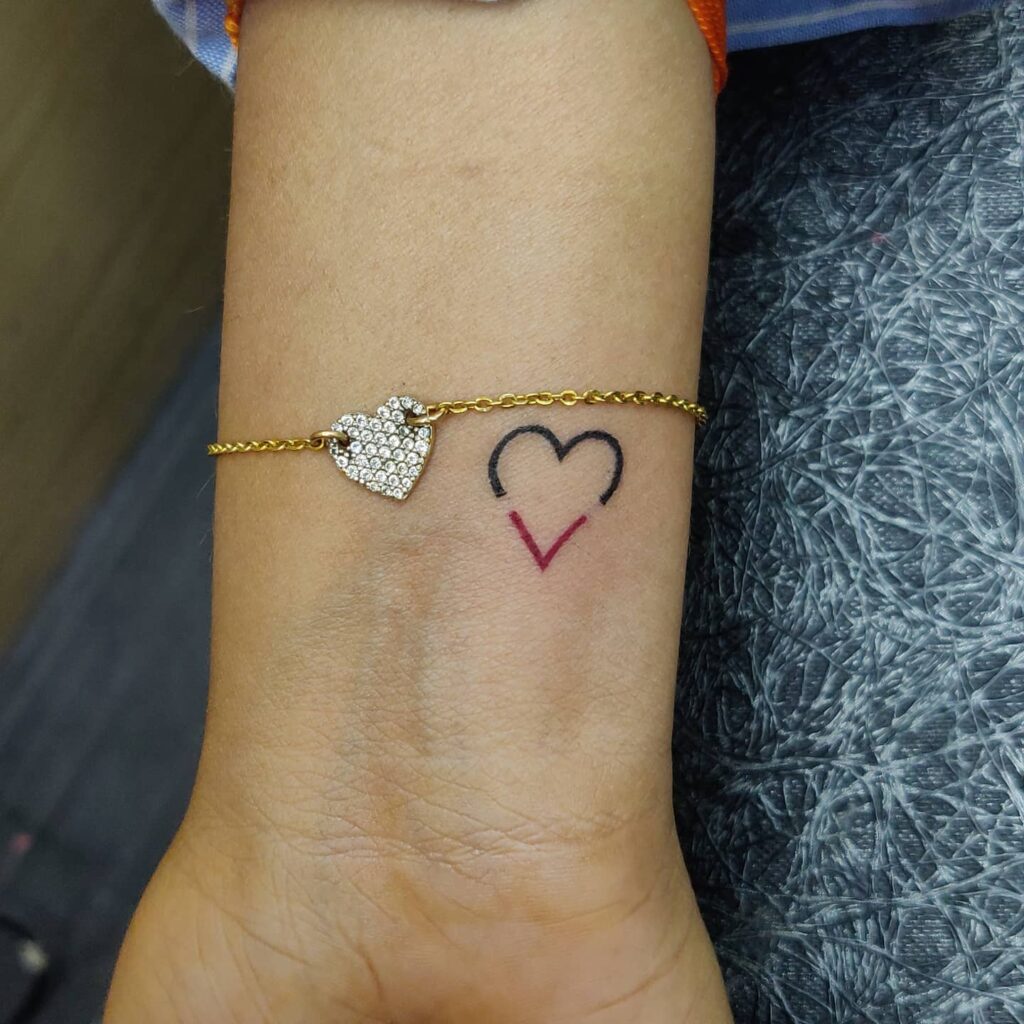 Row of Minimalist Hearts Tattoo small heart tattoo ideas tattoo