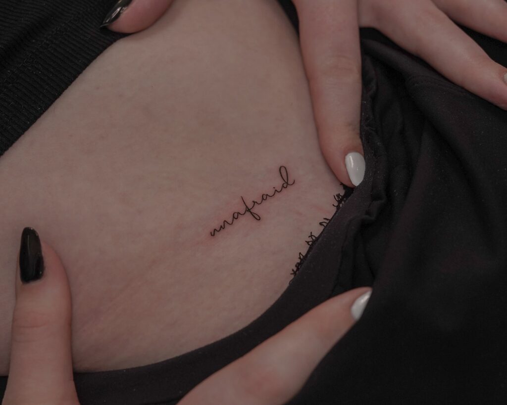 Unafraid Lower Abdomen Tattoo