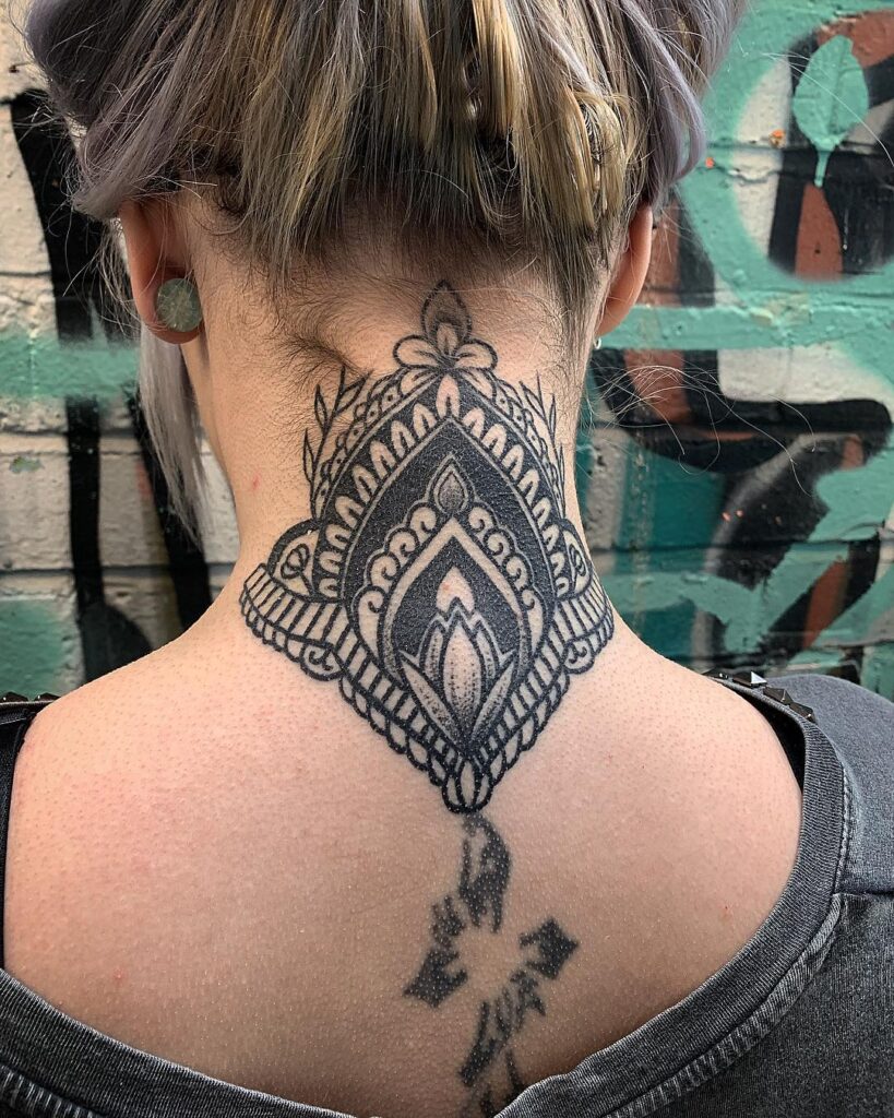 Understated Nape of Neck Silhouette tattoo