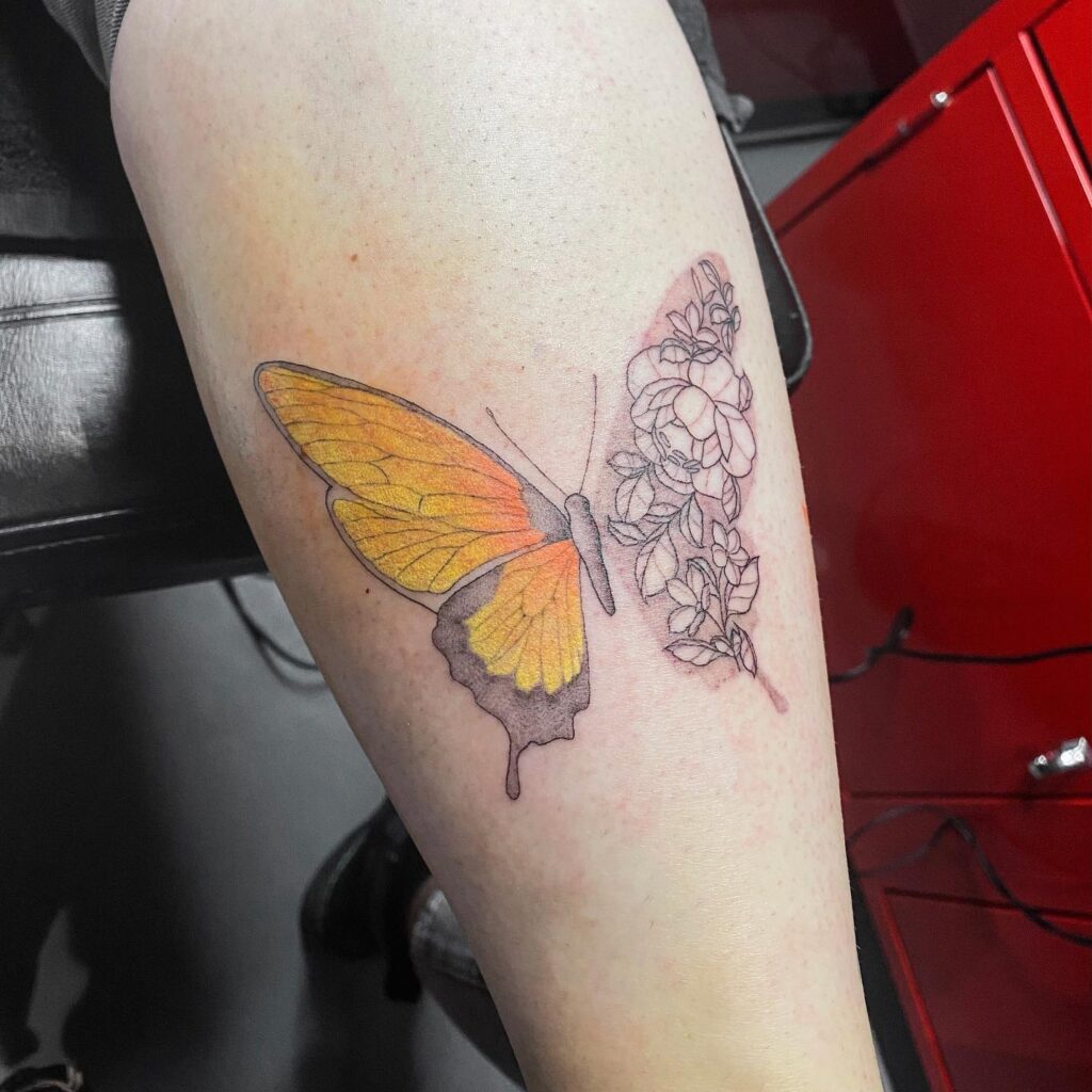 Vibrant Butterfly and Sketch Floral Tattoo half butterfly half flower tattoos tattoo
