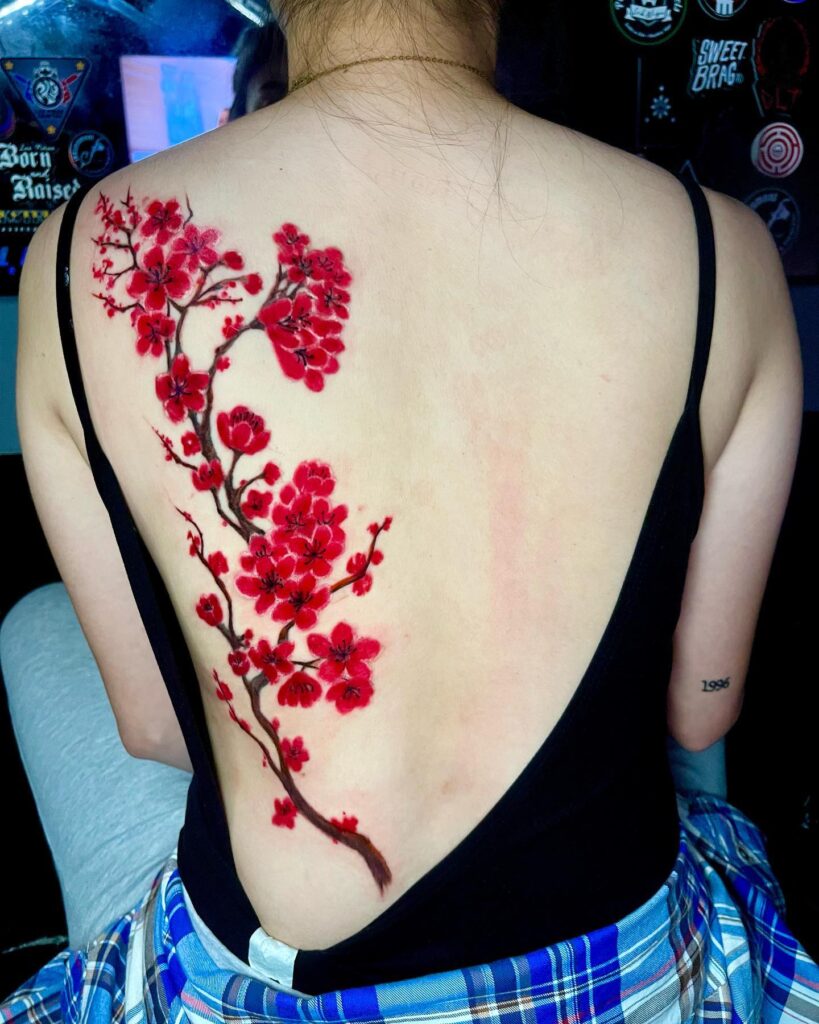 Vibrant Cherry Blossom Back Tattoo cherry blossom tattoo ideas tattoo
