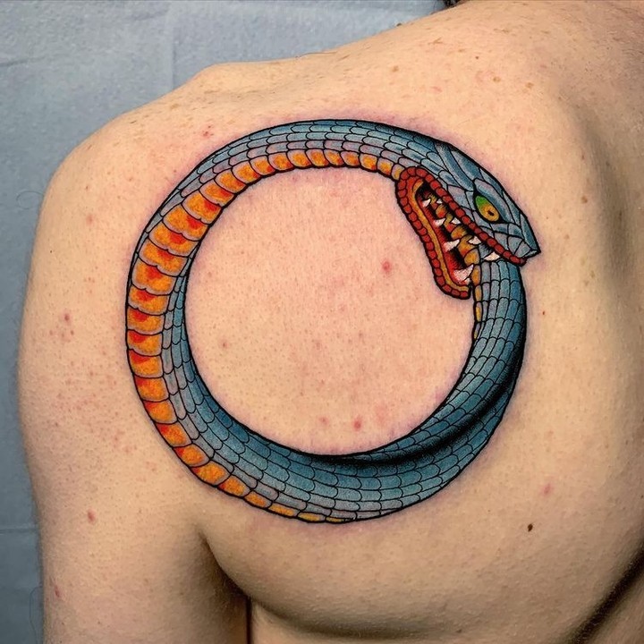 Tiny Ouroboros Tattoo On Inner Arm