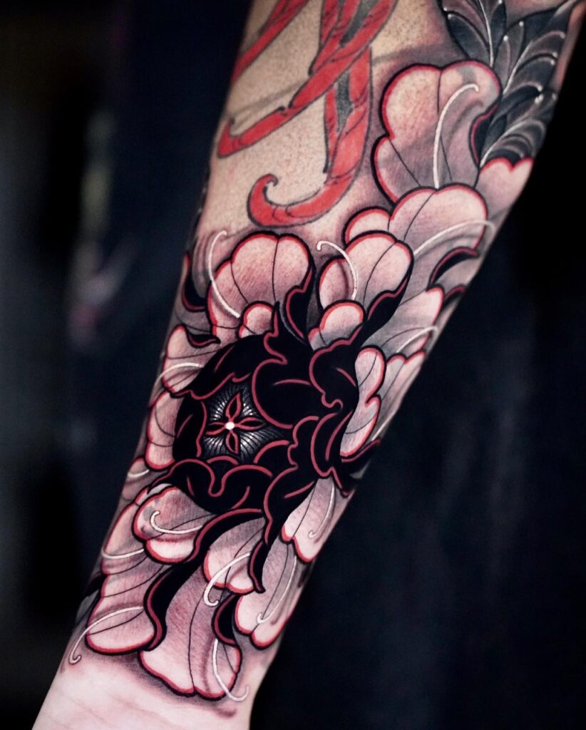 Vibrant Peony with Bold Black and Red Accents peony flower tattoo ideas tattoo