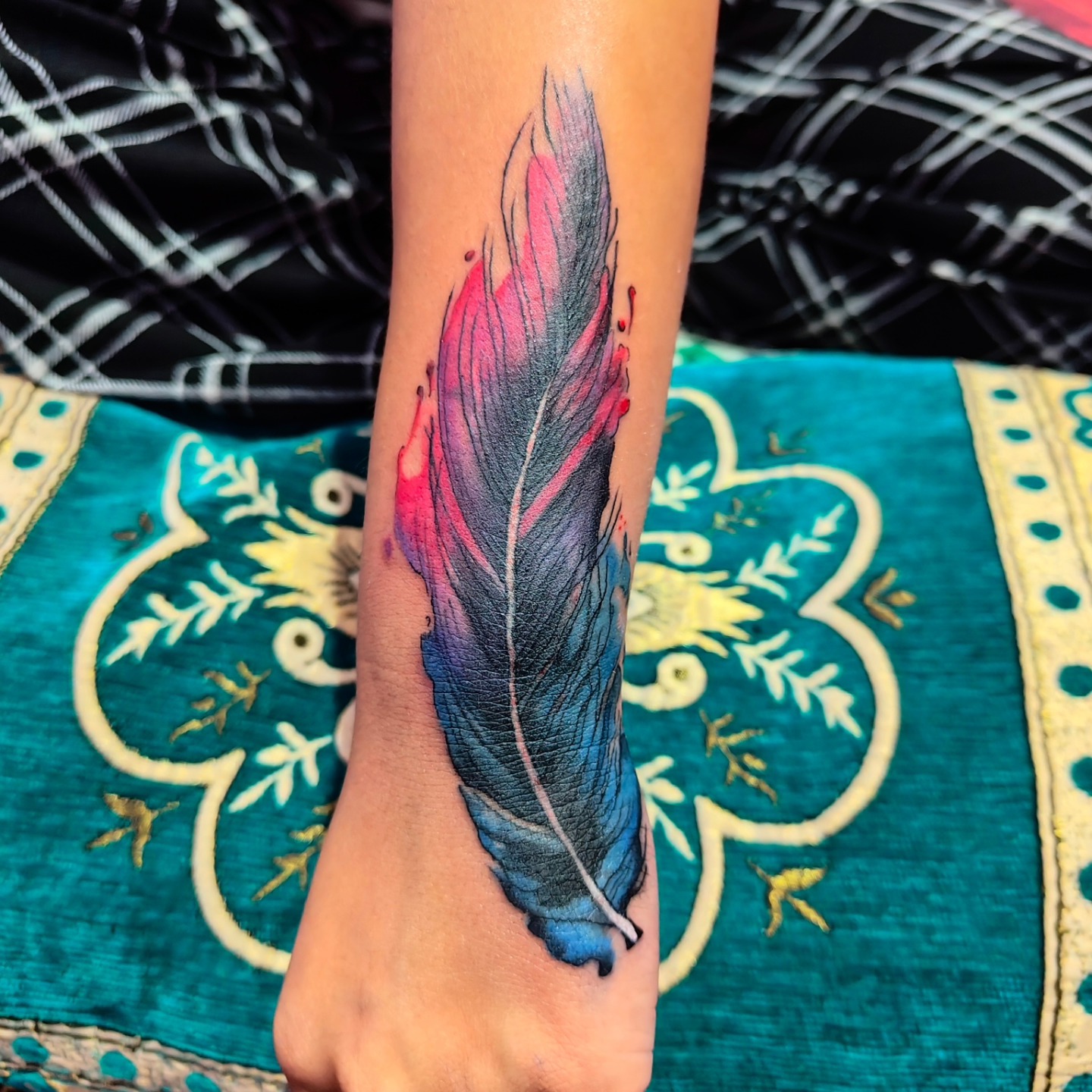 Infinity Feather Wrist Tattoo